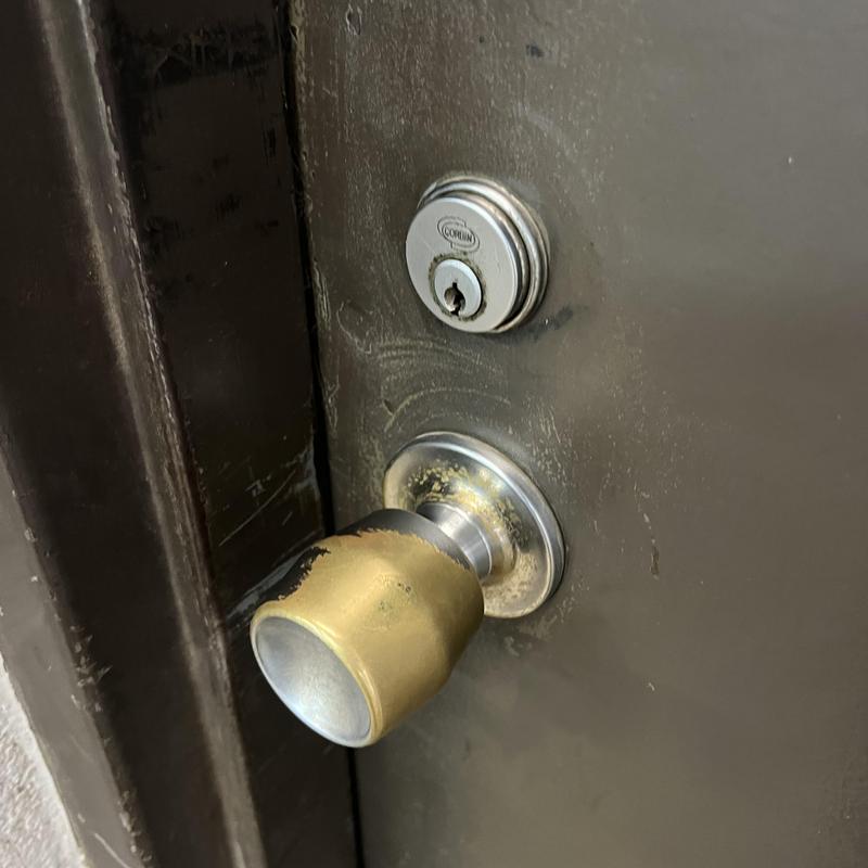 Door knob and deadbolt lock on commercial door