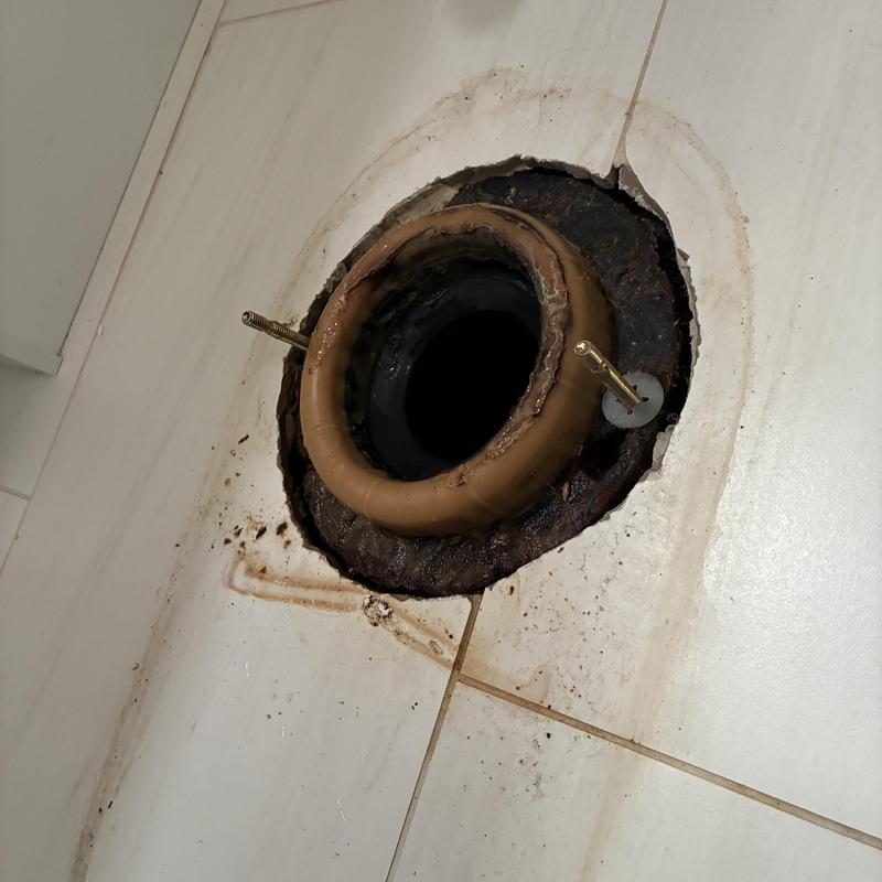 Toilet flange and wax ring replacement under tile floor