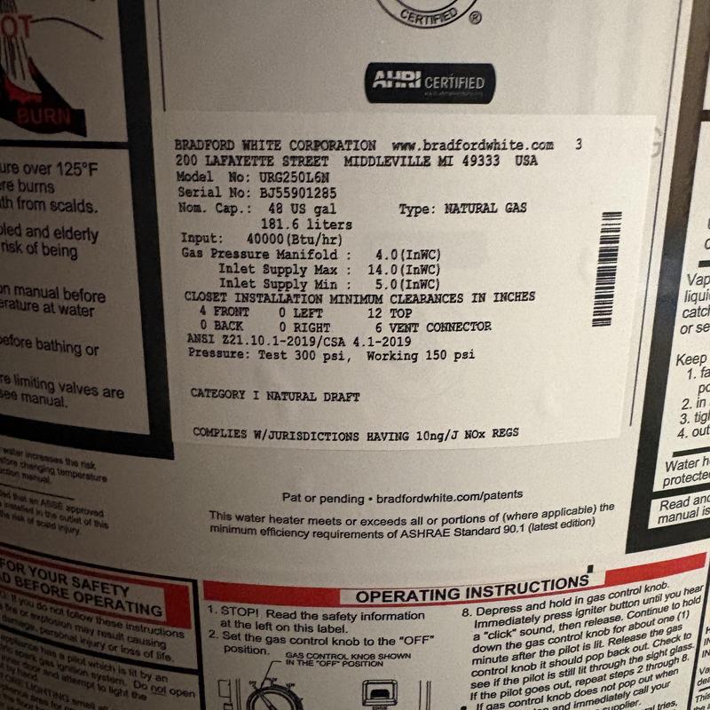 Natural gas water heater label with installation details