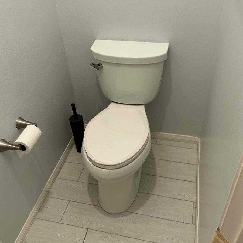 Toilet seat and lid installation in master bathroom