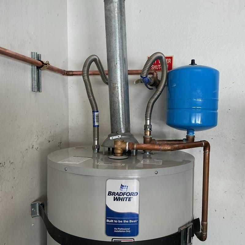 Thermal expansion tank and water heater piping installation