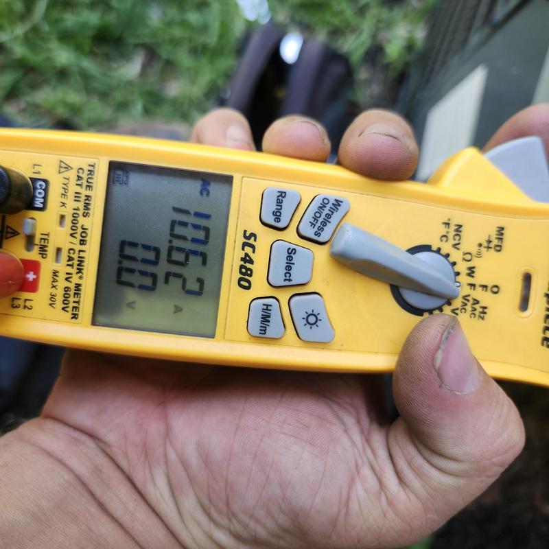 Voltage meter testing dual capacitor on Goodman HVAC system Voltage meter testing dual capacitor on Goodman HVAC system