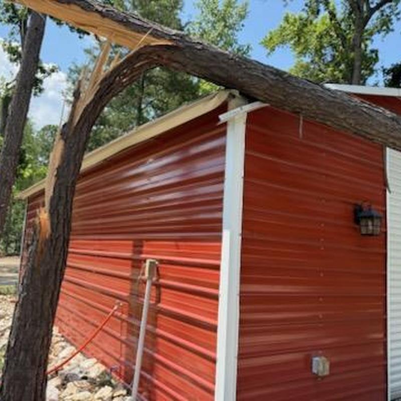 Metal roof and wall panels with storm damage Metal roof and wall panels with storm damage