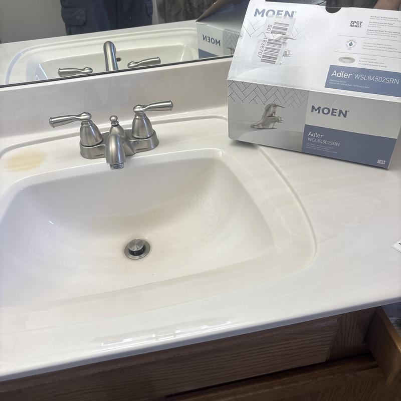 Lavatory faucet with Moen Adler box on countertop