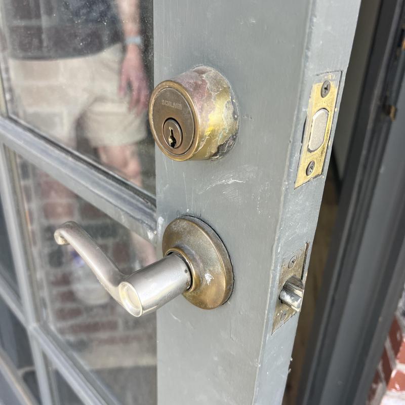 Interlocking lockset and deadbolt on exterior door