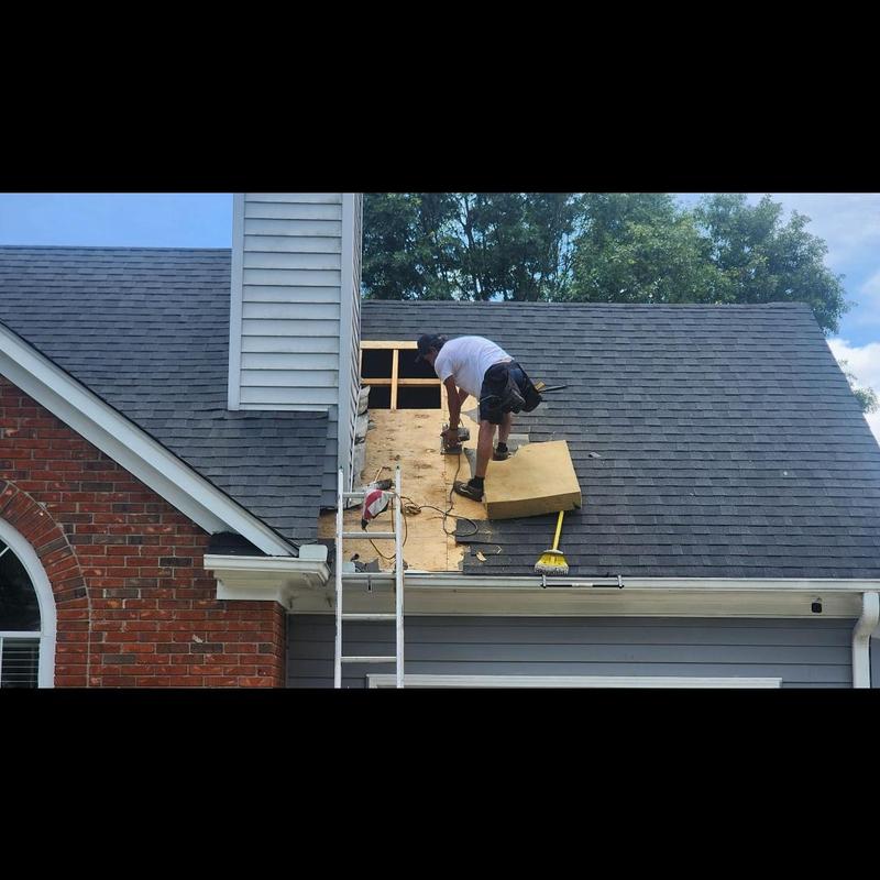 Chimney roof decking removal and repair in progress