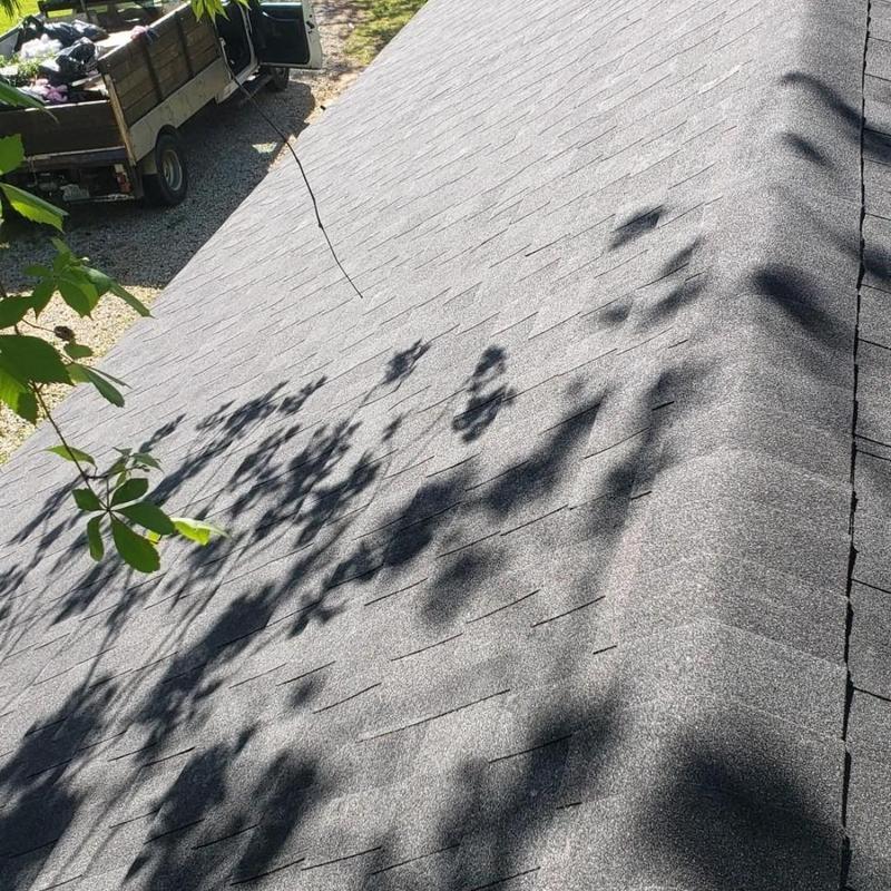 Owens Corning Onyx Black roof shingles on barn decking