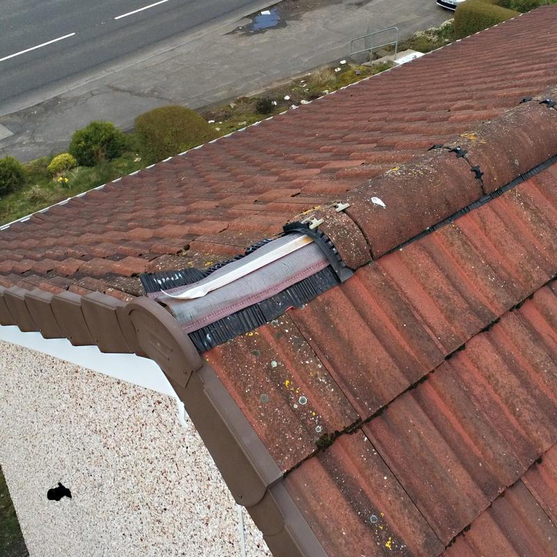 Tile roof ridge cap with brush and underlayment Tile roof ridge cap with brush and underlayment
