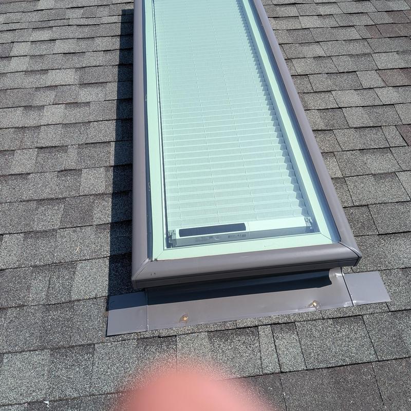 Velux skylight installation on asphalt shingle roof