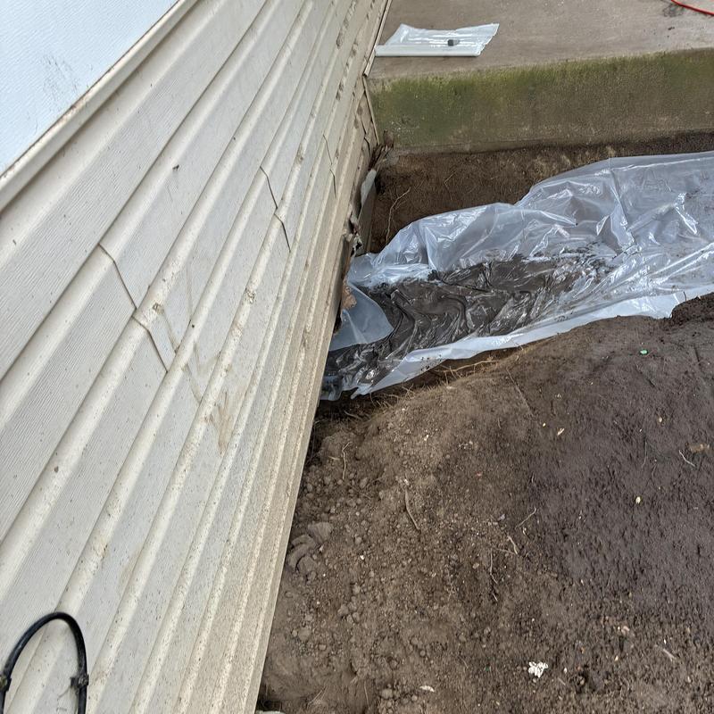Gas line exterior trench with leak test plastic cover Gas line exterior trench with leak test plastic cover