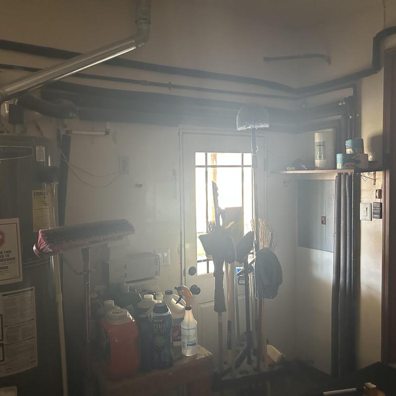 Electrical panel with overhead service riser and tools Electrical panel with overhead service riser and tools