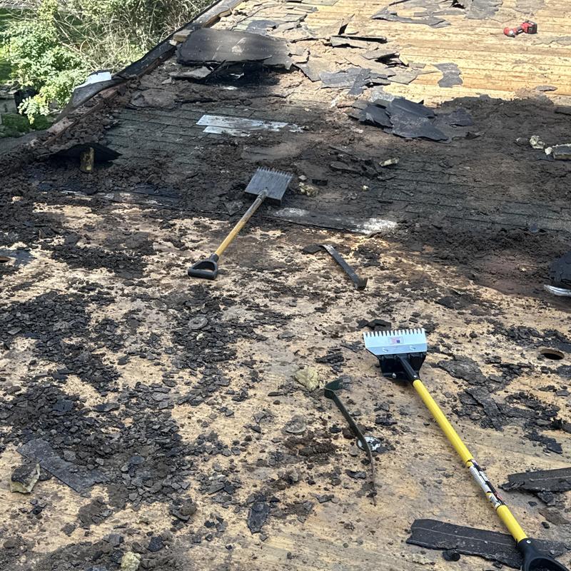 Low slope flat roof tear-off with roofing tools Low slope flat roof tear-off with roofing tools
