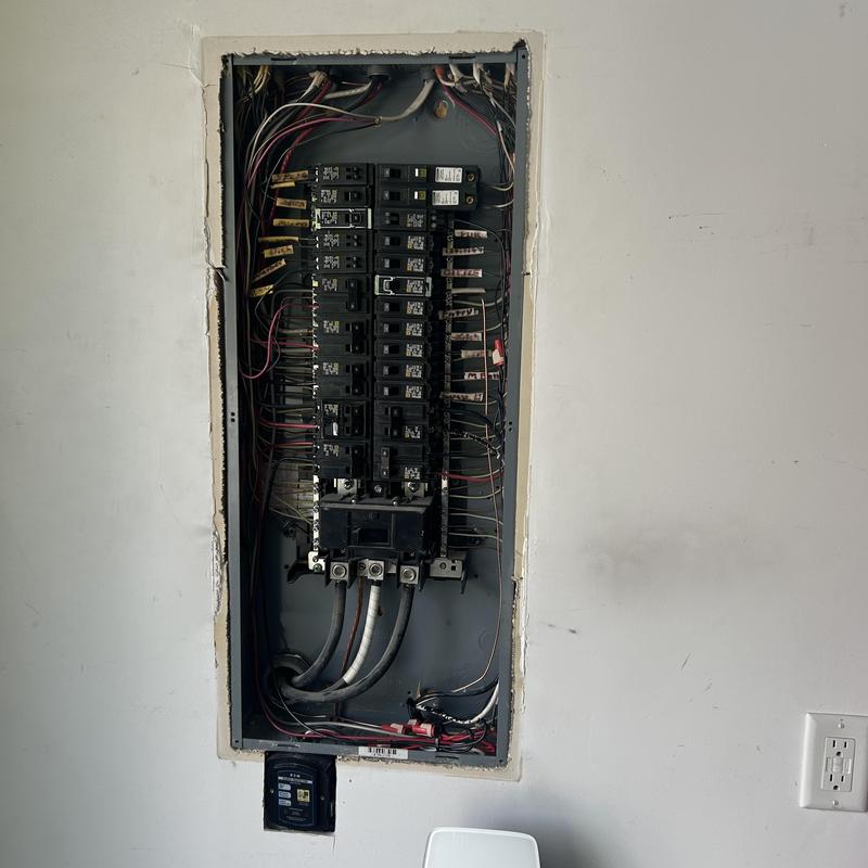 Electrical breaker panel with Tesla charger wiring installed Electrical breaker panel with Tesla charger wiring installed