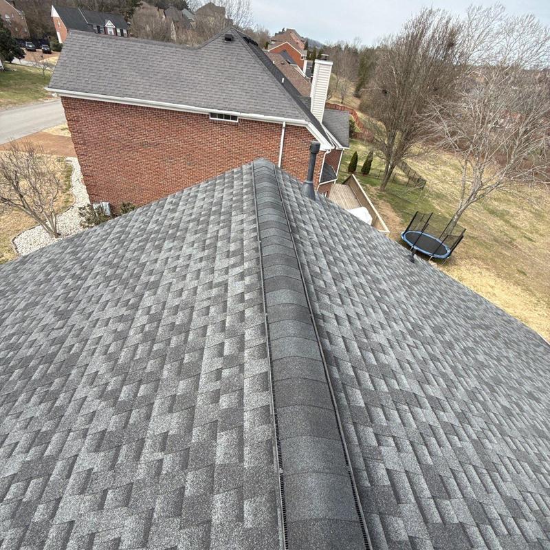 Shingle roof with ridge vent installation inspection