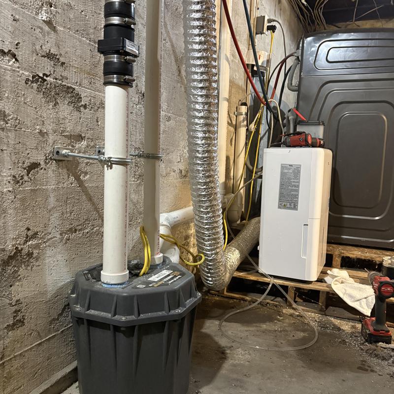 Ejector pump and laundry plumbing installation Ejector pump and laundry plumbing installation