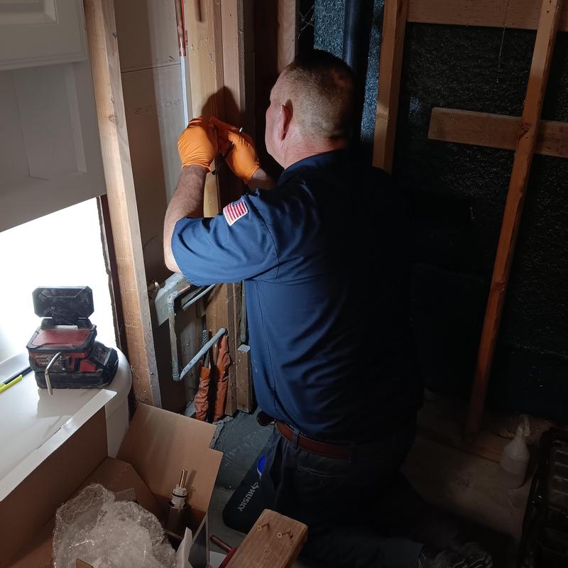 Shower valve assembly installation in wall framing
