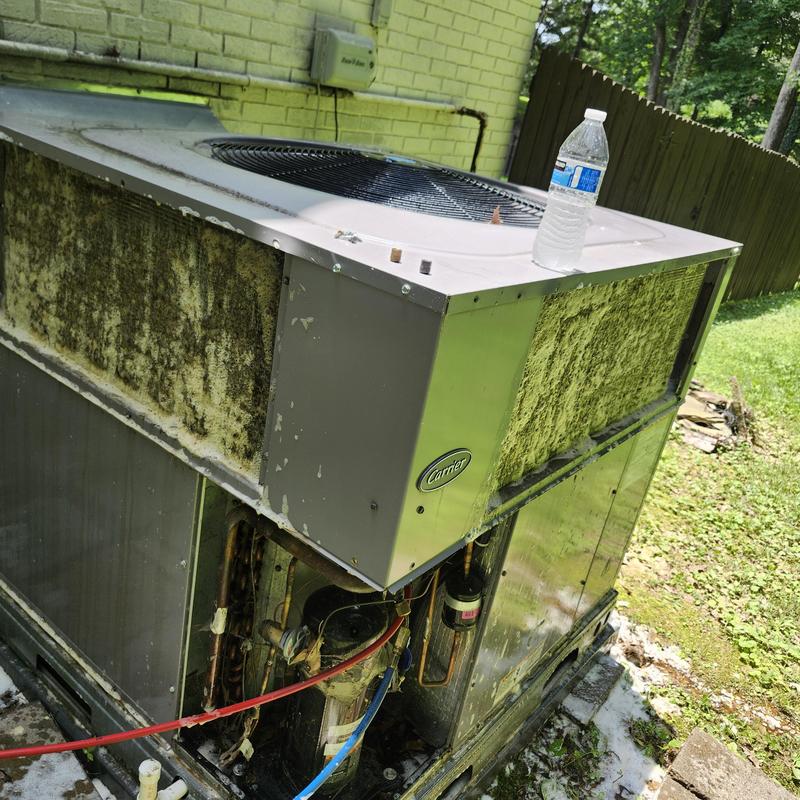 Condenser coils severely clogged on rooftop unit Condenser coils severely clogged on rooftop unit