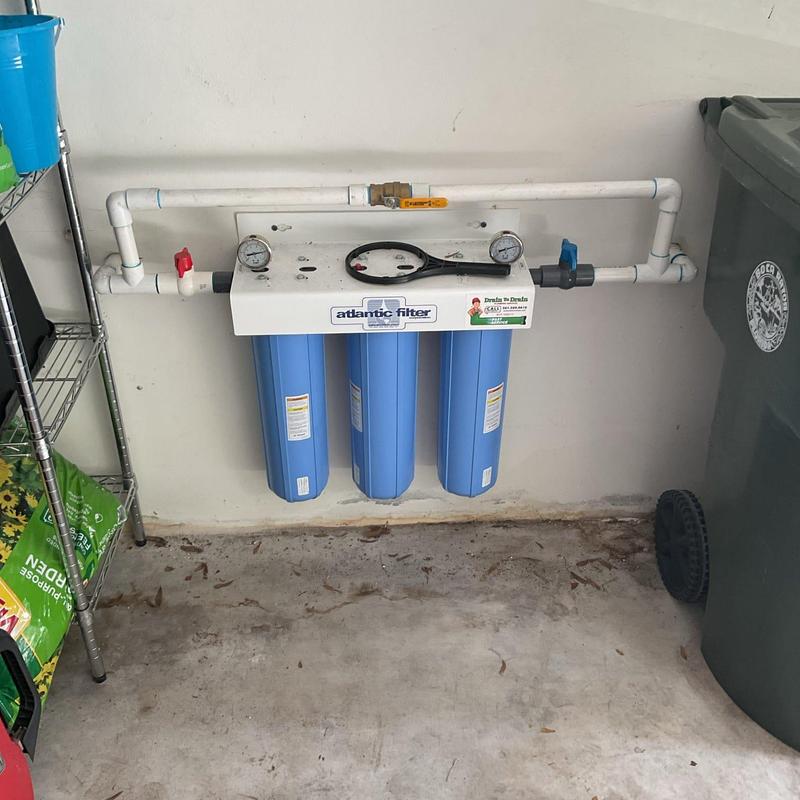 Whole house water filtration system with triple filters