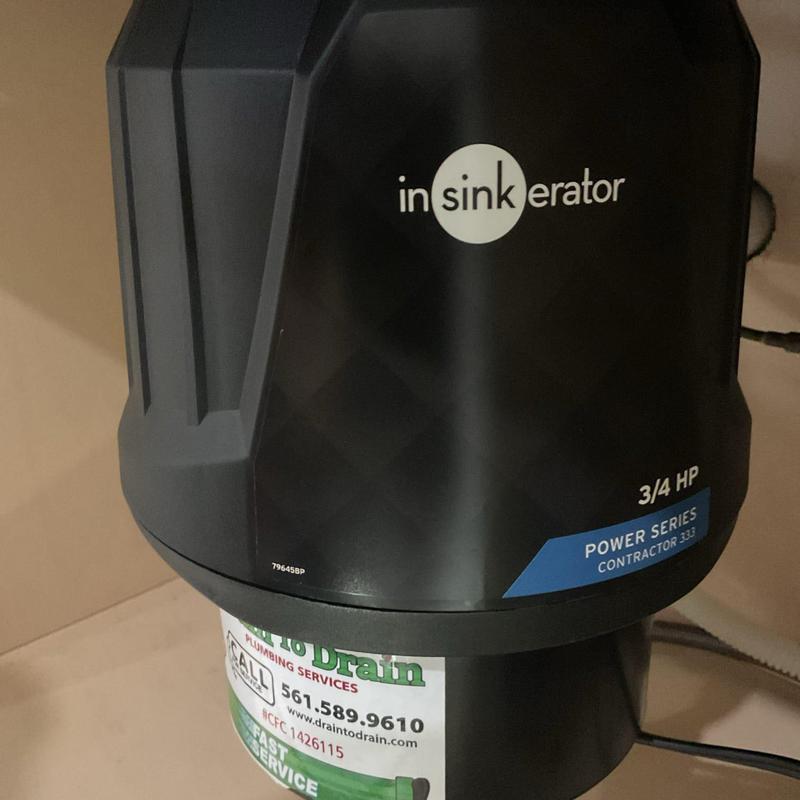 Insinkerator garbage disposal under kitchen sink