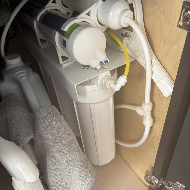 RO water filter system with tubing in cabinet