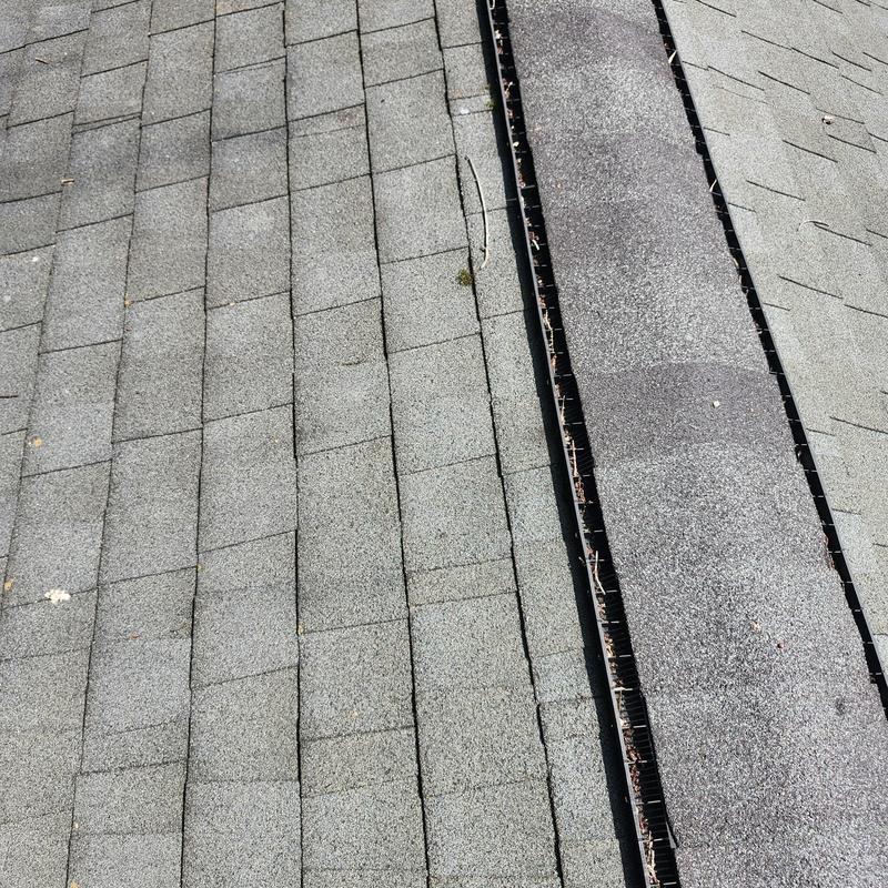 Roof shingles and vent boot with minor damage Roof shingles and vent boot with minor damage