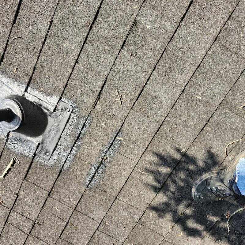 Roof vent boot and shingles with sealing repair area Roof vent boot and shingles with sealing repair area