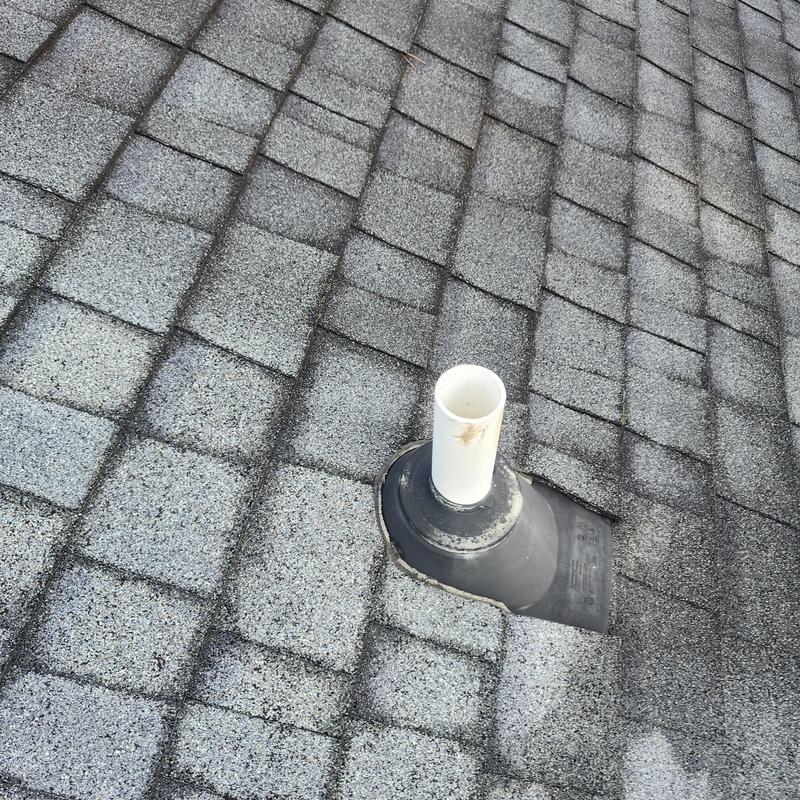 Roof vent pipe flashing on asphalt shingle roof Roof vent pipe flashing on asphalt shingle roof