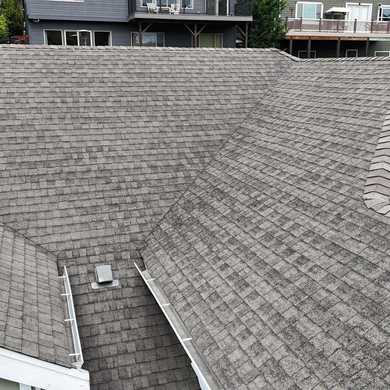 Asphalt shingle roof with valley and vent detail
