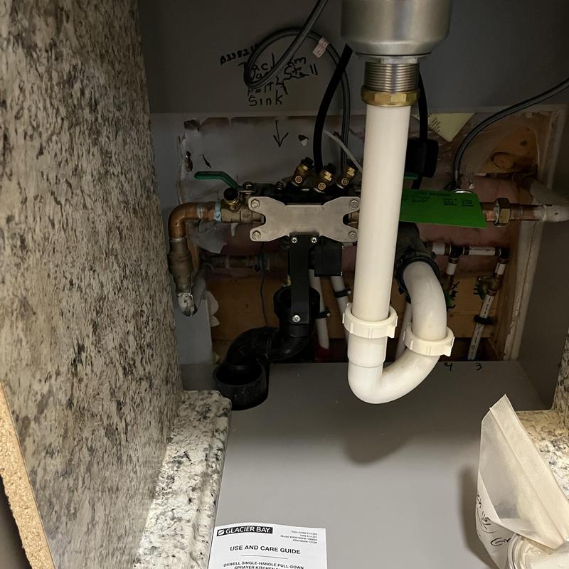 Backflow assembly under kitchen sink with testing valves Backflow assembly under kitchen sink with testing valves