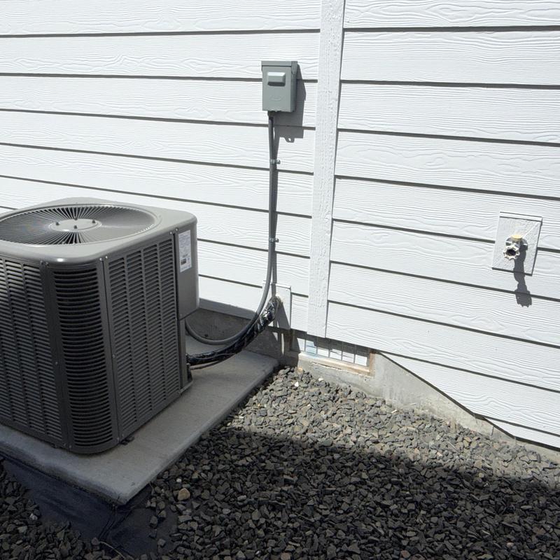 Air conditioning condenser unit with power disconnect box Air conditioning condenser unit with power disconnect box