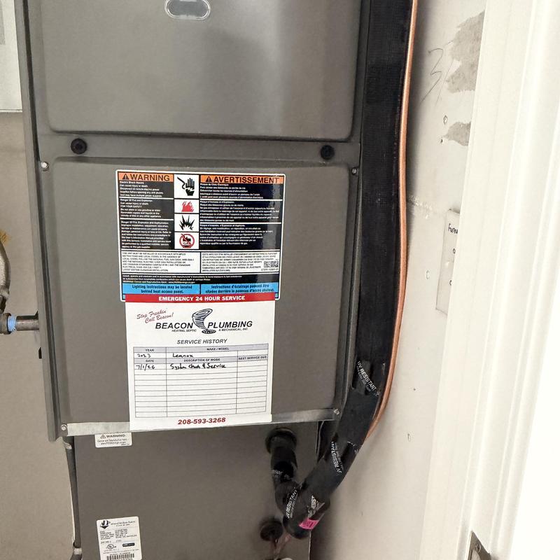 Furnace unit with service history label attached Furnace unit with service history label attached
