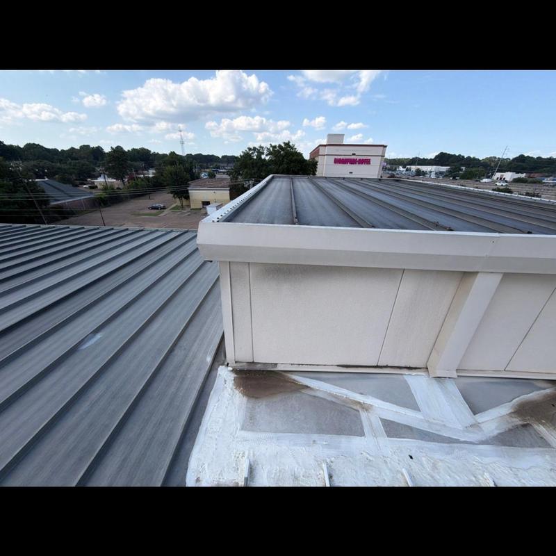 Standing seam metal roof inspected for leaks