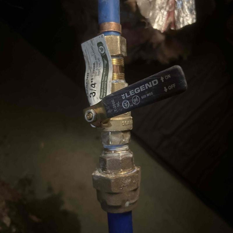 Main water line ball valve with handle installed Main water line ball valve with handle installed