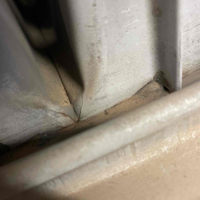 Reznor heater cracked heat exchanger close-up view Reznor heater cracked heat exchanger close-up view