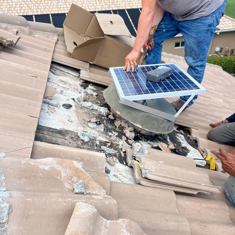 Concrete tile roof around solar vent repair Concrete tile roof around solar vent repair
