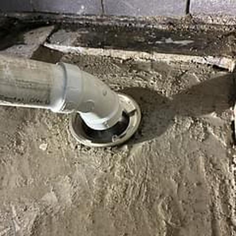 Grease trap pipe connection in concrete floor installation Grease trap pipe connection in concrete floor installation