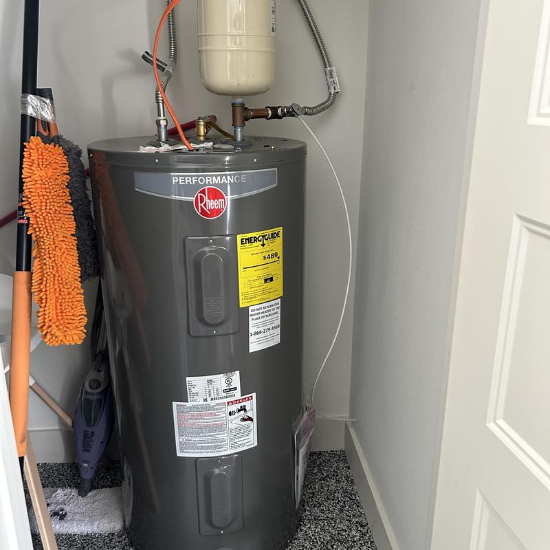 Icemaker water line installation by water heater Icemaker water line installation by water heater