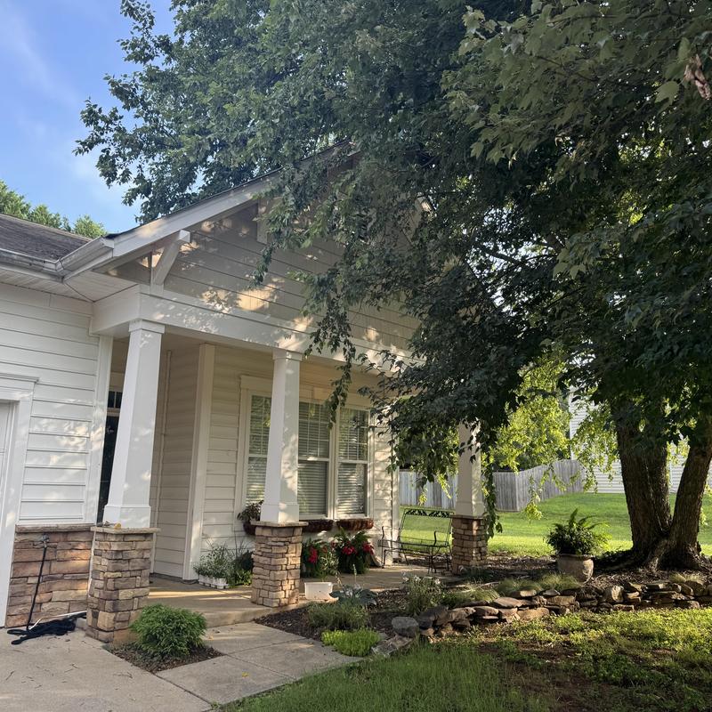 Asphalt shingle roof replacement on residential porch