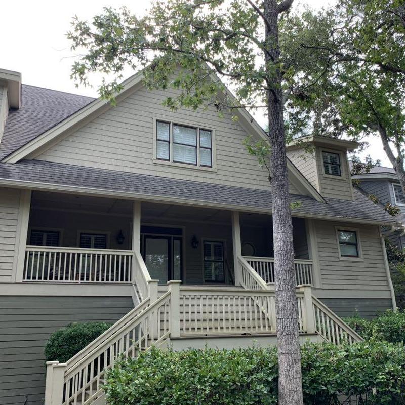 Asphalt shingle roof on residential porch and staircase