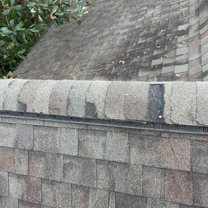 Shingle roof ridge cap with ventilation strip and nails
