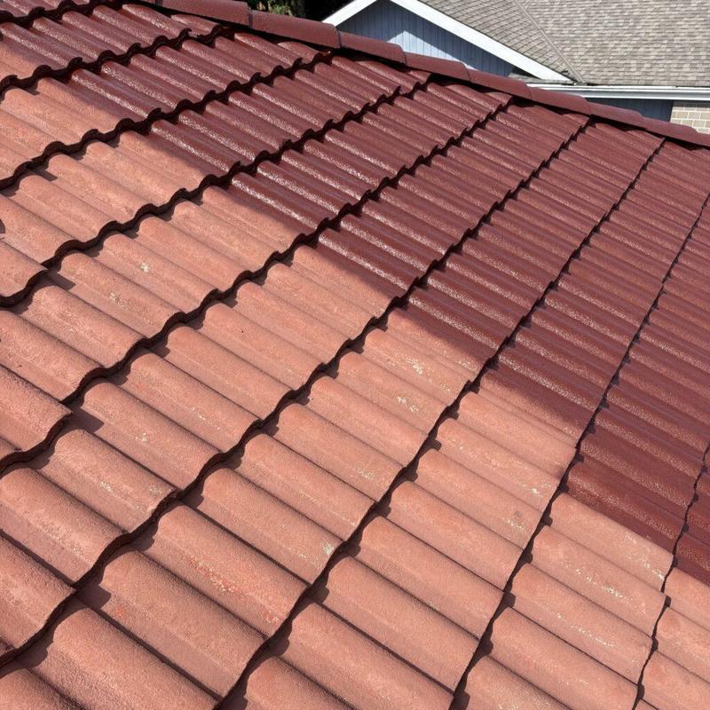 Tile roof with color fading and weathering signs Tile roof with color fading and weathering signs