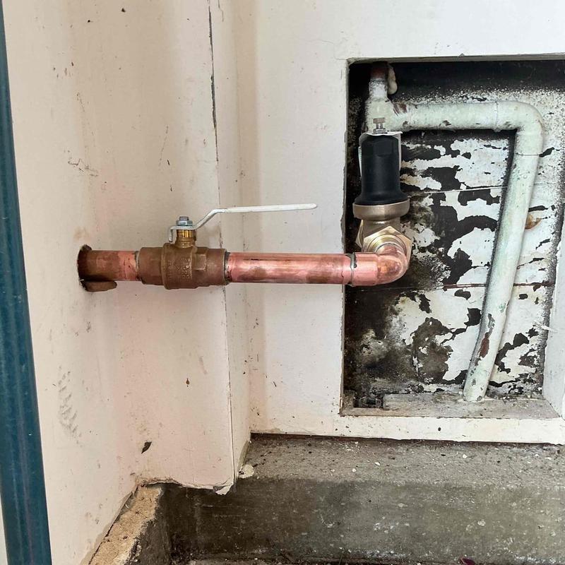 Copper pipe with ball valve and PRV regulator installation