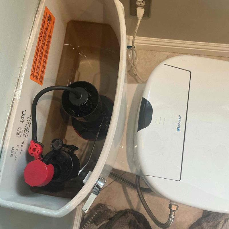 Toilet tank flush valve and fill valve assembly installation