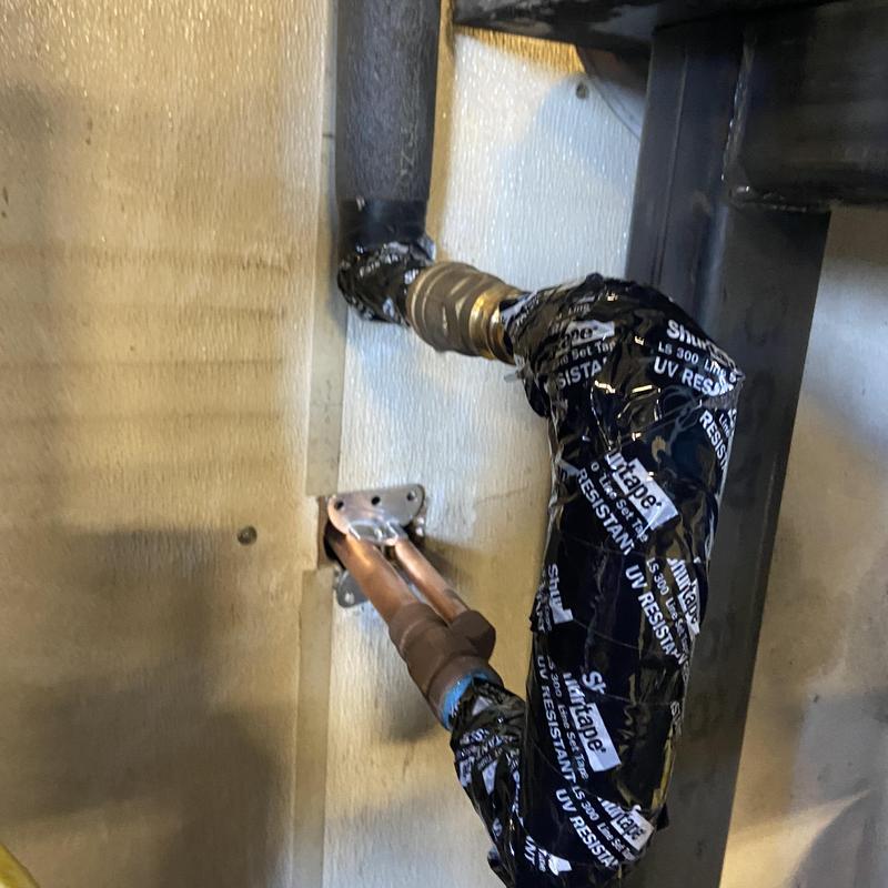 Copper water pipes with UV resistant insulation wrap Copper water pipes with UV resistant insulation wrap