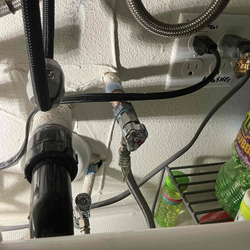 Angle stop valve and icemaker supply reconnect under sink
