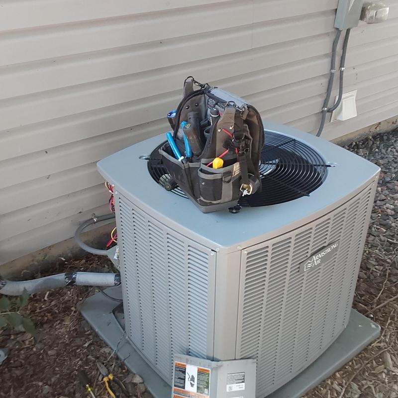 Armstrong air conditioner with technician tool bag