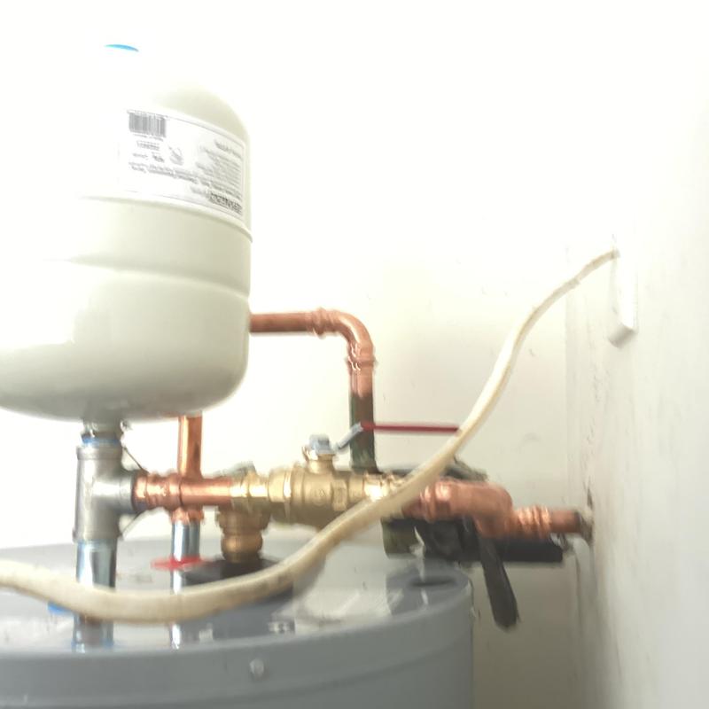 Electric water heater with new expansion tank installation Electric water heater with new expansion tank installation