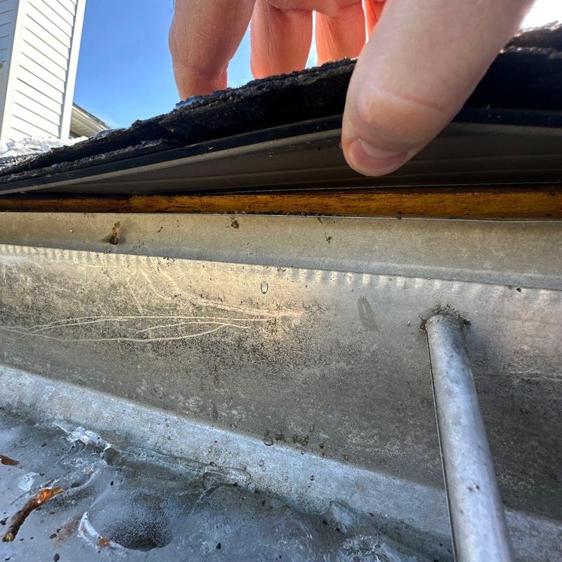 Roof flashing inspection during hail damage assessment