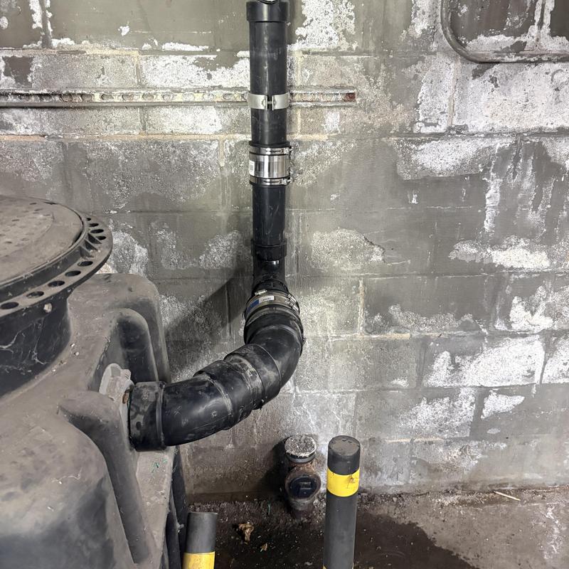 Mainline pipe to grease interceptor with clamps
