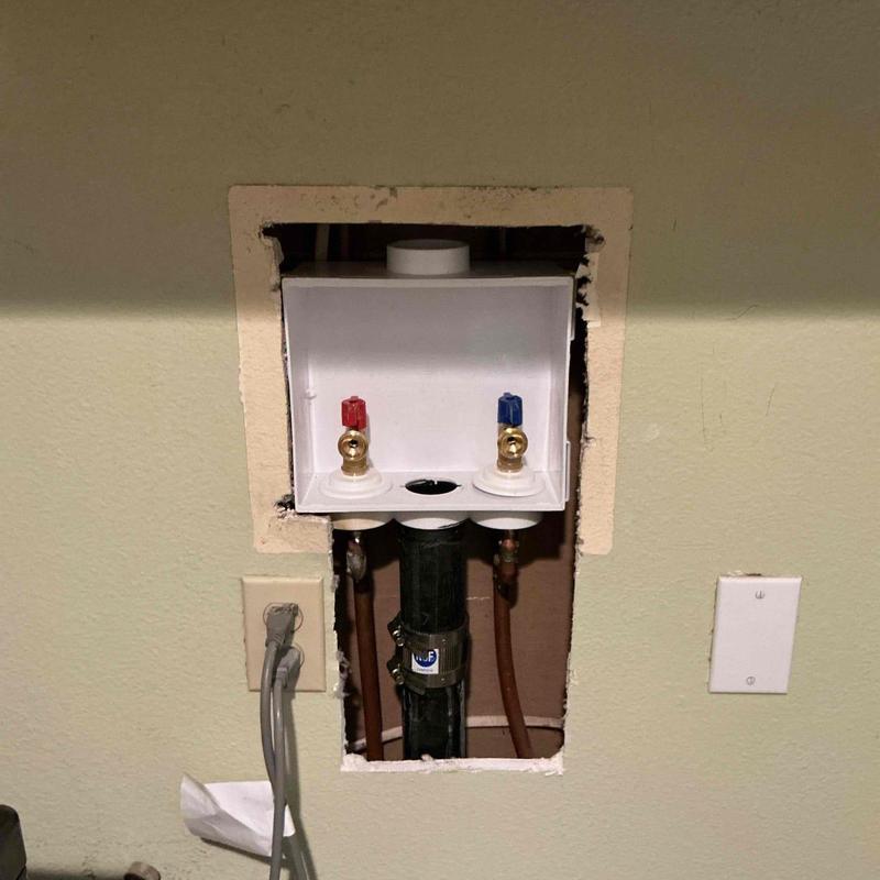 Washing machine valve box with hot and cold valves
